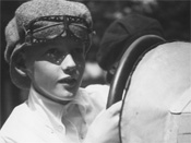 Bill Milliken, age 12, at the wheel of Duesenberg No. 4 pushcar; 1922, Old Town, Maine