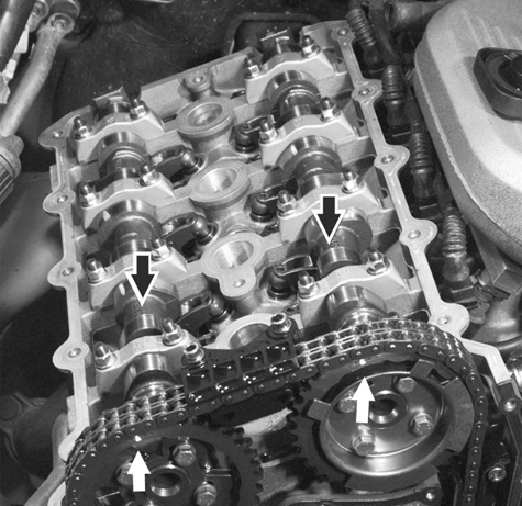 Engine and cylinder head service, including VANOS timing chain setup and adjustment.
117 Camshaft Timing Chain
page 117-2