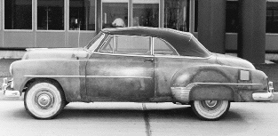 Bodied entirely in plastic, this 1952 Chevrolet convertible was GM’s first use of the new technology for automobile bodies. The body was left unpainted to expose the translucence of the fiberglass construction.
