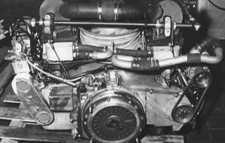 Engines for IMSA 934s had to retain their standard air/water intercoolers but could be extensively modified otherwise. In this example the circulating pump for the intercooler's coolant is driven from the camshaft on the left side of the chassis.