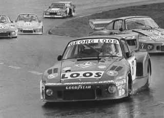 Driving this Porsche 935 entered by the George Loos stable, Rolf Stommelen was the German sports-racing champion of 1977. Other Porsches as well as a Toyota were among his rivals.
