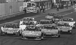 At the Nrburgring in the ADAC-Goodyear 300, ten Porsche turbos are led by Bob Wollek in the Number 2 Kremer-Porsche 935.
