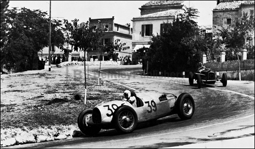 The successes of the rear-engined Auto Union (here in the 1935 Coppa Acerbo) brought worldwide fame to the still-new Porsche design organization.