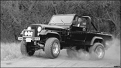 Fig. 17-1. Josh Solomon's modified
CJ-8 Scrambler features approved
aftermarket modifications including
EFI. Know what parts are legal before
you begin modifying your engine or
planning an engine conversion.
From Chapter 17 - Engine
Performance and Modifications.