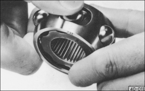 Fig. 5-17. Balls being installed in inner CV joint cage and hub.
Suspension and Steering
page 18